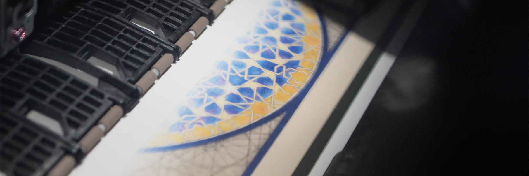 Photograph taken through the printer's window of Gillian Turnham's artwork entitled JEWEL.